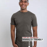An upper body shot of a tall slim guy wearing a dark grey medium tall t-shirt.