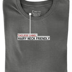 A folded dark grey medium tall t-shirt showing the tagless label.