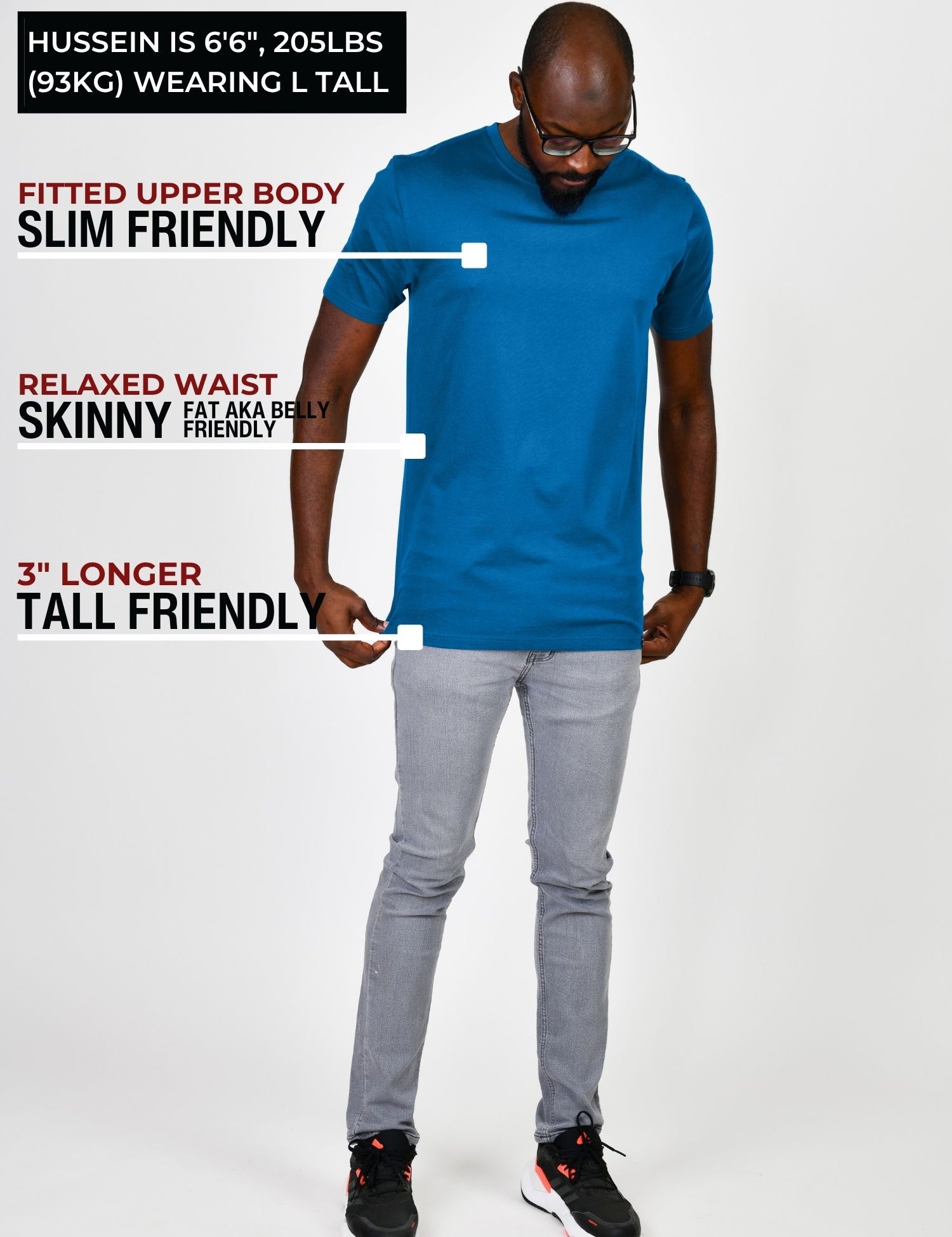 A head to toe shot in a studio of a tall and athletic guy wearing an azure large tall slim t-shirt.