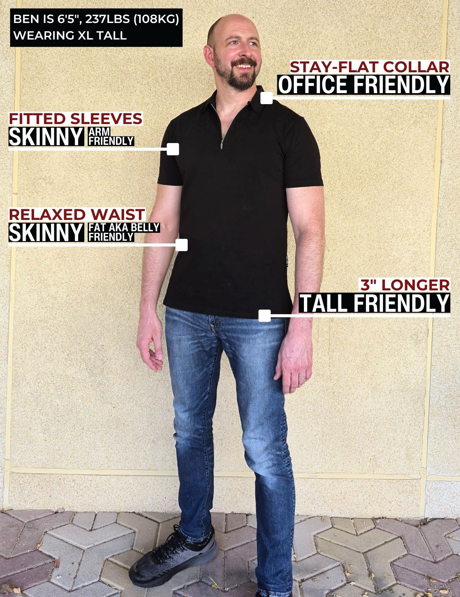 A head to toe shot of a tall slim guy wearing an XL tall black zip polo shirt.