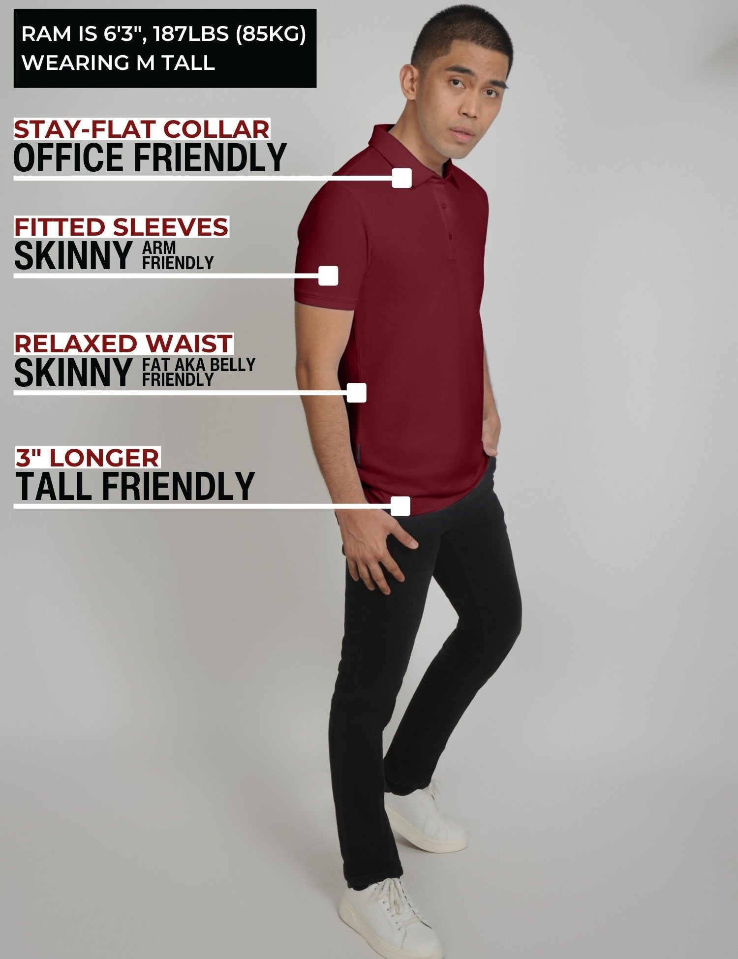 A head to toe shot of a tall slim man standing in a studio and wearing a maroon medium tall polo shirt.