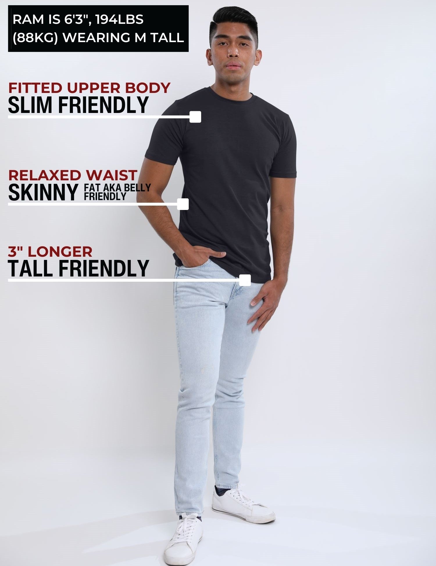 A head to toe shot of a tall slim guy  in a studio and wearing a charcoal medium tall slim t-shirt.