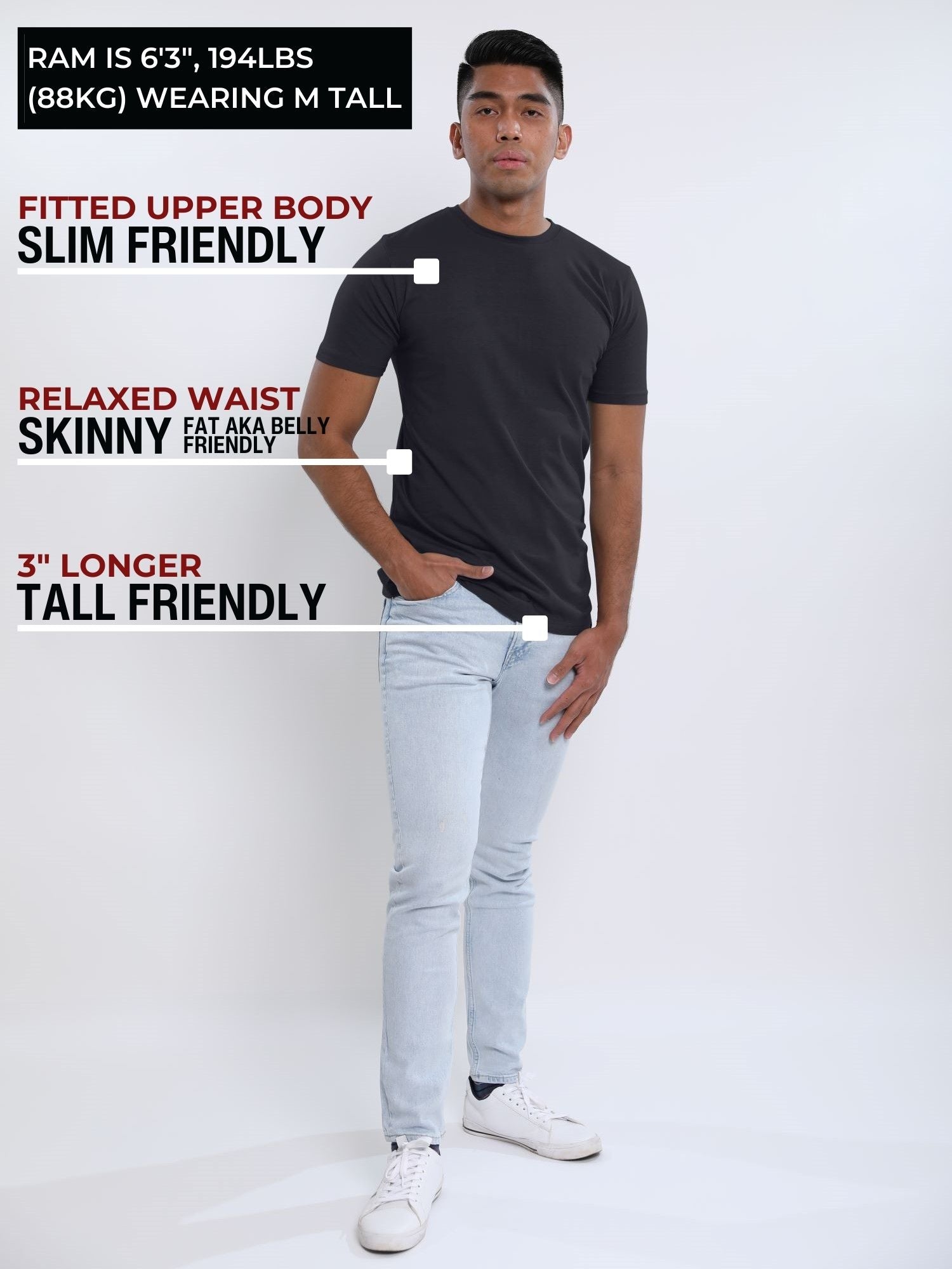 A head to toe shot of a tall slim guy in a studio and wearing a charcoal medium tall slim t-shirt.