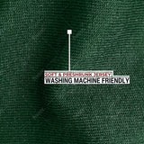 A close up of the soft and stretchy fabric that is preshrunk and washing machine friendly.