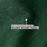 A close up of the dark green 100% organic cotton fabric.