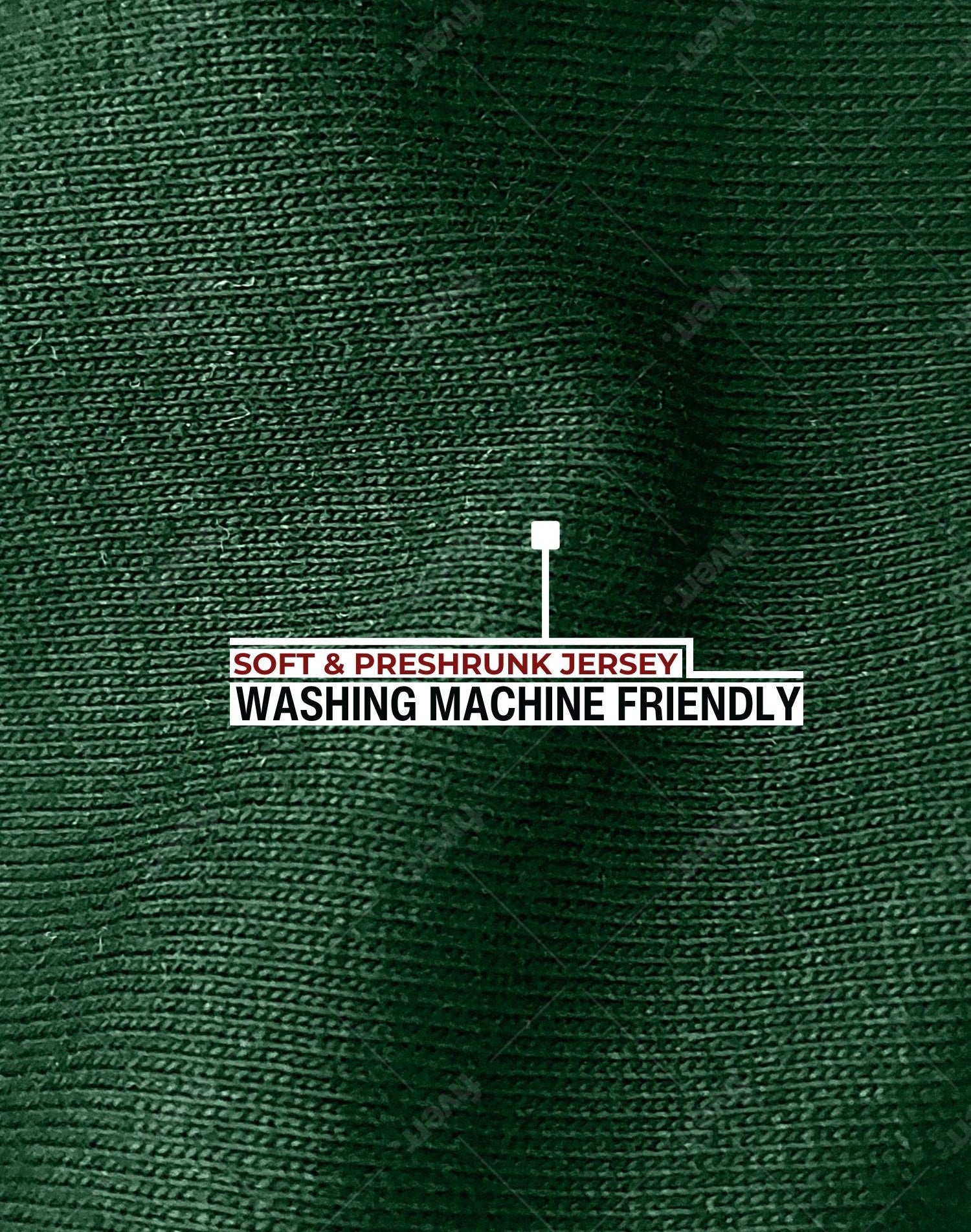A close up of the dark green 100% organic cotton fabric.