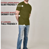 A head to toe shot of a tall muscular guy in a studio and wearing an olive XL tall t-shirt.