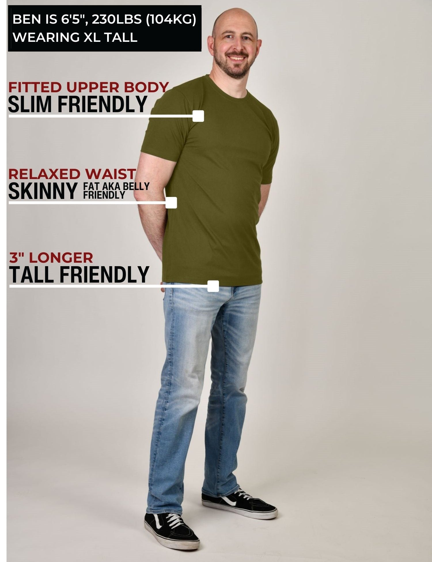A head to toe shot of a tall muscular guy  in a studio and wearing an olive XL tall t-shirt.