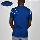 A shot from behind of a tall and slim guy in a studio and wearing a navy large tall slim t-shirt.