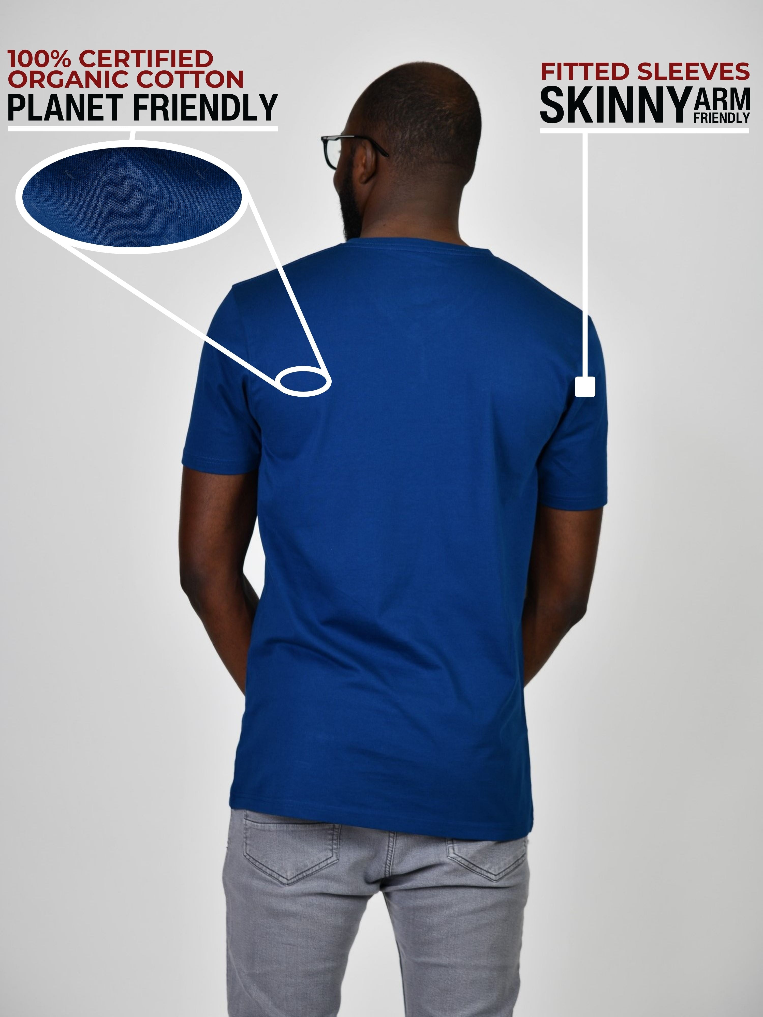 A shot from behind of a tall and slim guy in a studio and wearing a navy large tall slim t-shirt.