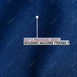 A close up of the soft and stretchy fabric that is preshrunk and washing machine friendly.