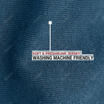 A close up of the soft and stretchy fabric that is preshrunk and washing machine friendly.