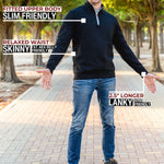 A head to toe shot of a tall athletic guy in a park wearing an XL tall extra long black quarter zip sweatshirt.
