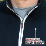 A close-up of the tall black quarter zip collar and the durable metal zipper.