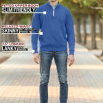 A head to toe shot of a tall athletic guy in a park wearing an XL tall extra long cobalt quarter zip sweatshirt.