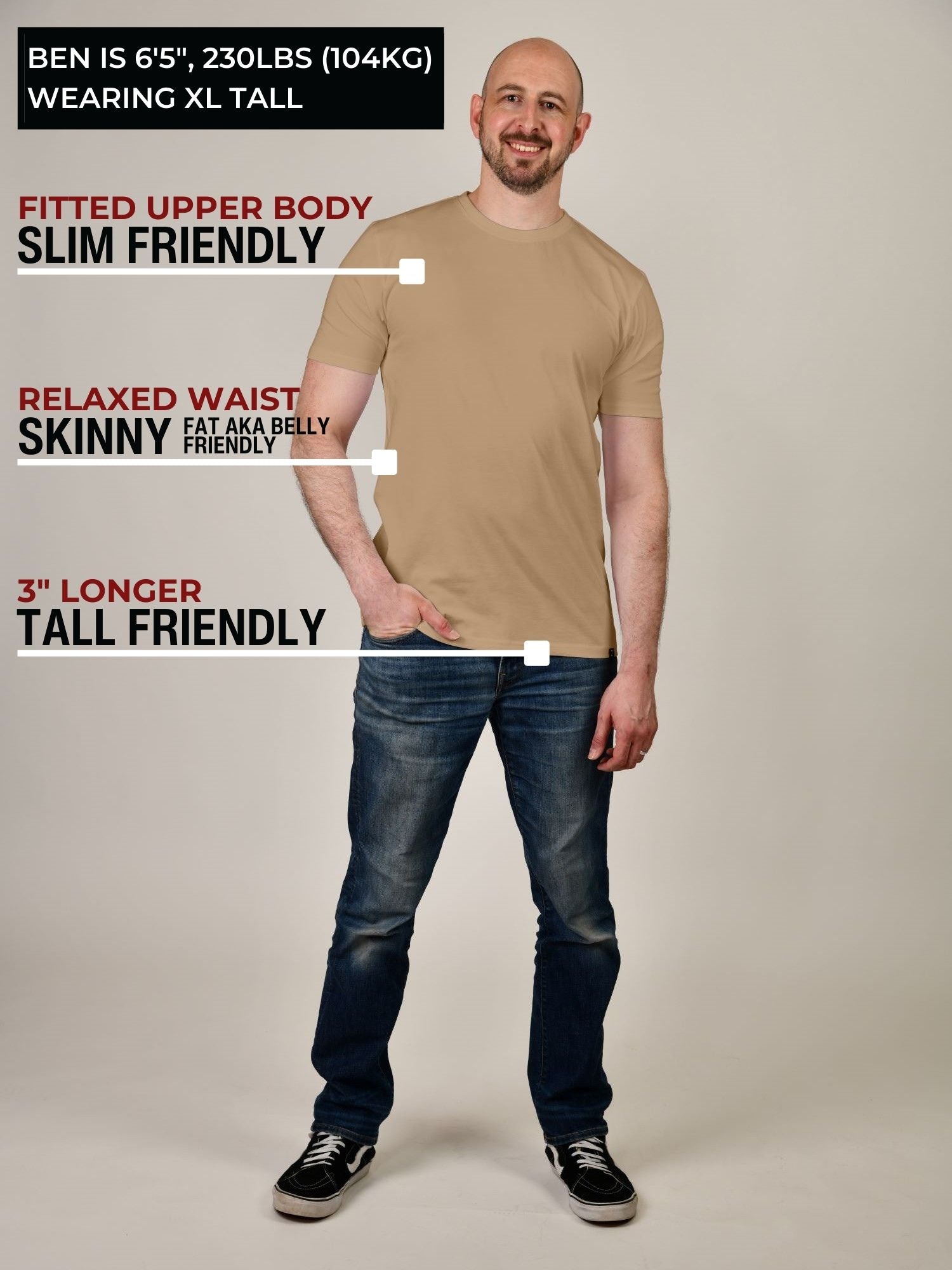 A head to toe shot of a tall slim guy in a studio and wearing a tan XL tall slim t-shirt.