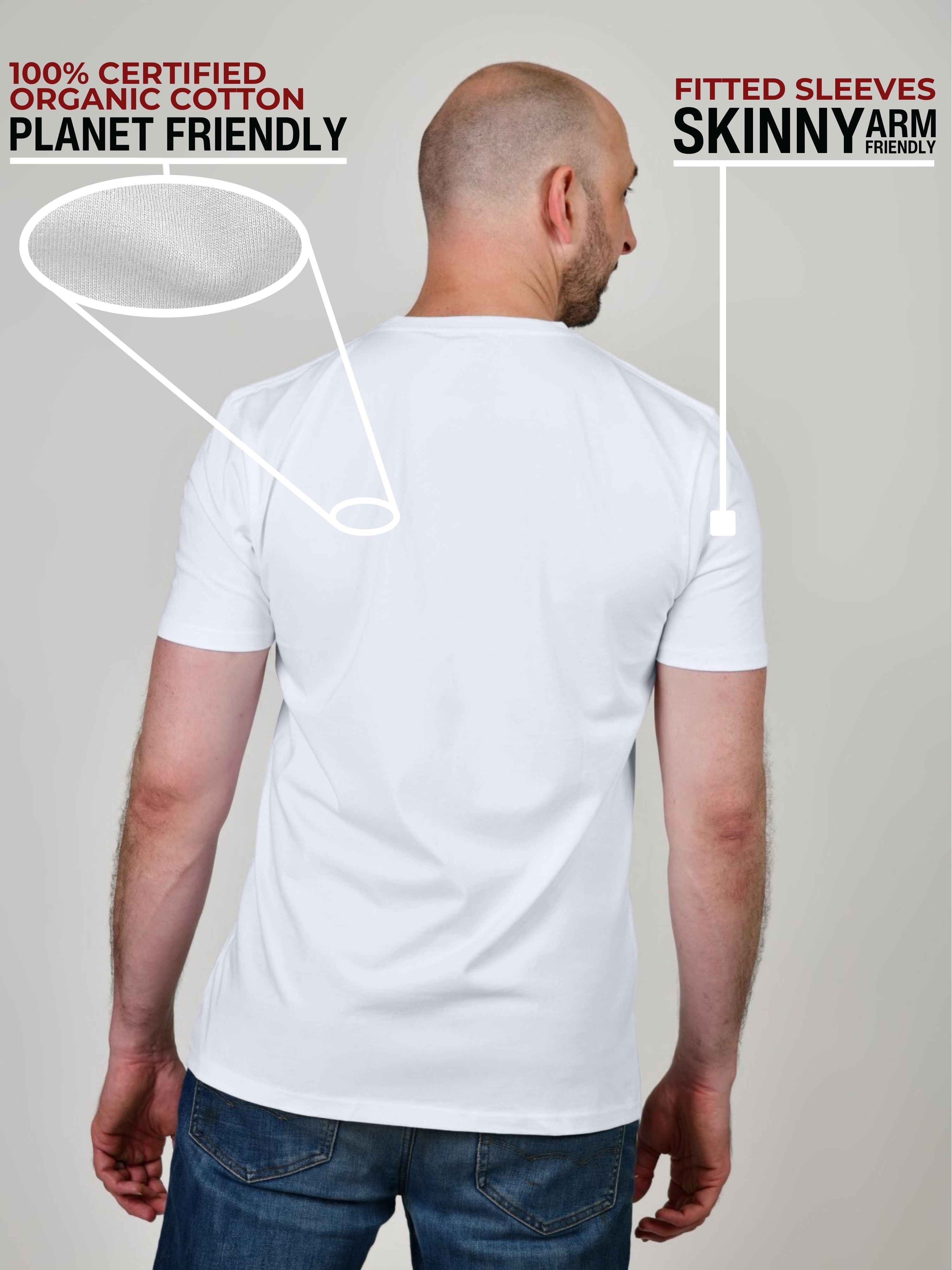 A shot from behind of a tall and slim guy in a studio and wearing a white XL tall slim t-shirt.