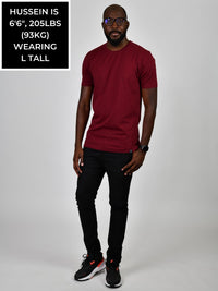 Thumbnail for A head to toe shot of a tall and slim guy in the studio, wearing a cabernet L tall slim t-shirt.