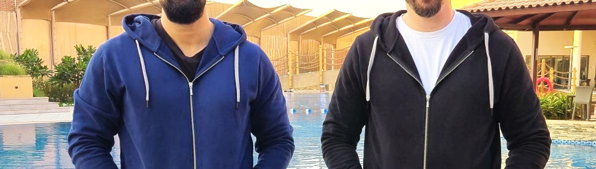 Two tall lean guys wearing XL Tall and 2XL Tall slim hoodies