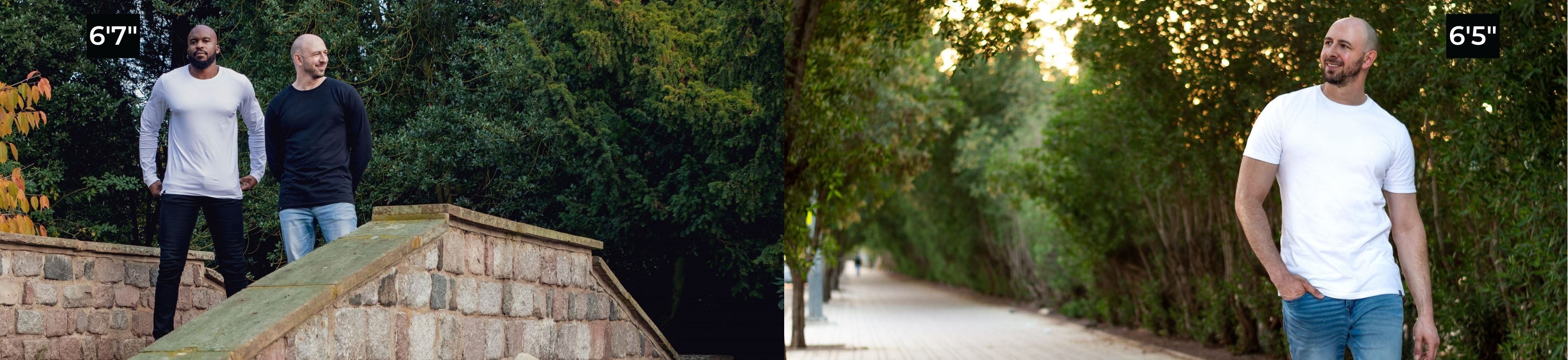 Two tall slim guys on a bridge in a park. They are wearing black and white tall long sleeve t-shirts.