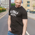 A tall skinny guy wearing a tall black slim t-shirt.