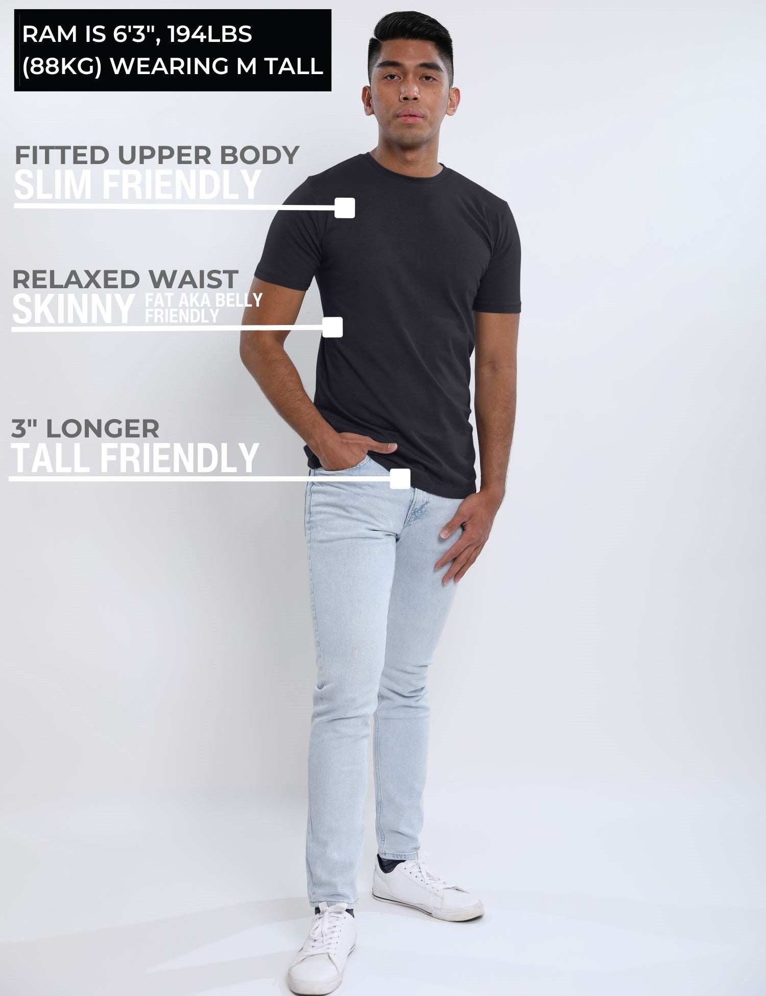 A head to toe shot of a tall and slim guy wearing a charcoal medium tall t-shirt.