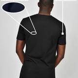 A shot from behind of a tall slim guy wearing a black heavyweight XL tall t-shirt.