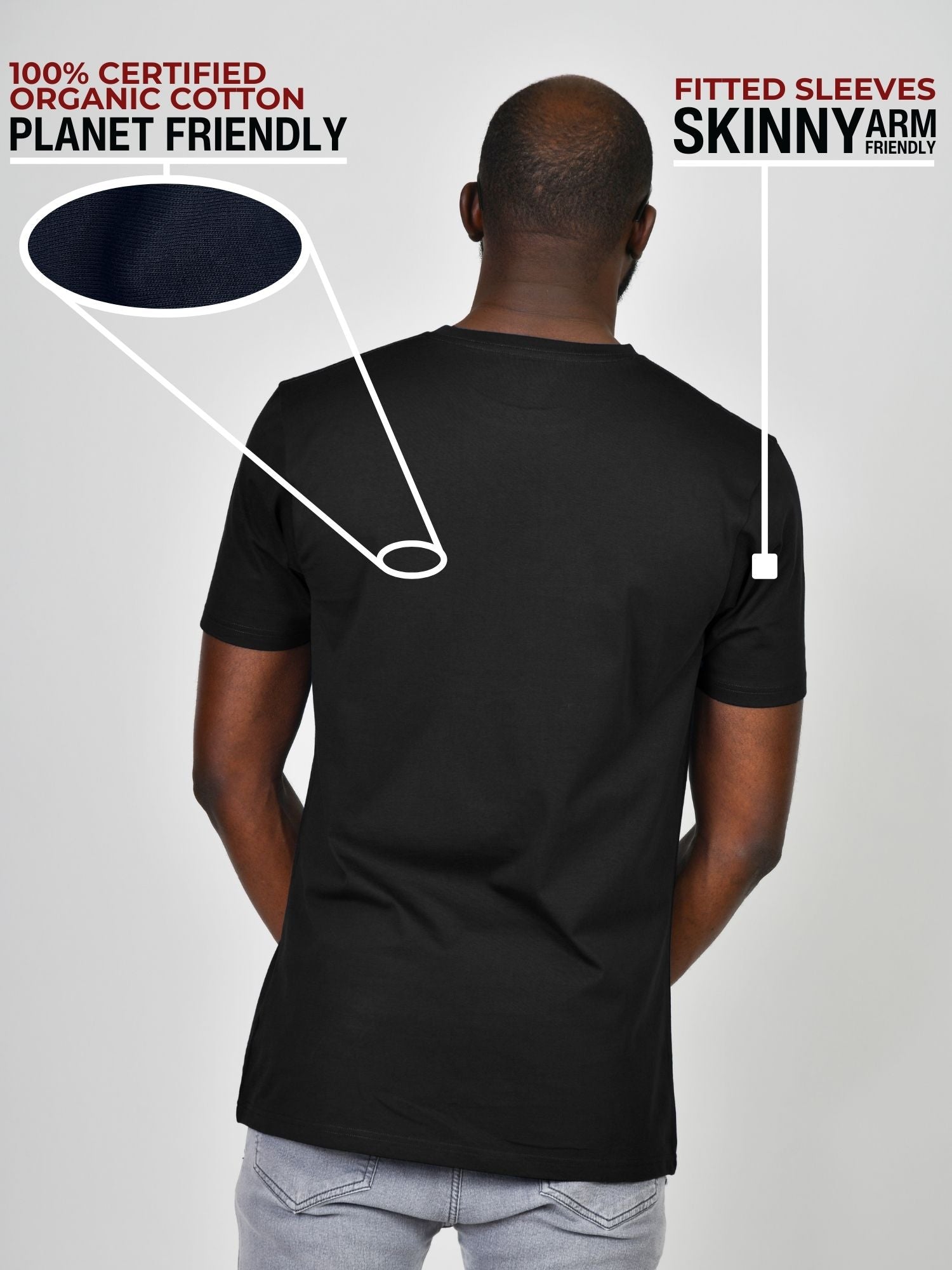 A shot from behind of a tall slim guy wearing a black heavyweight XL tall t-shirt.