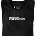 A close-up of a Just Tall heavyweight black t-shirt, showing the tagless label.