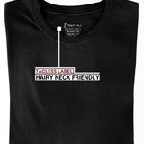 A close-up of a Just Tall heavyweight black t-shirt, showing the tagless label.