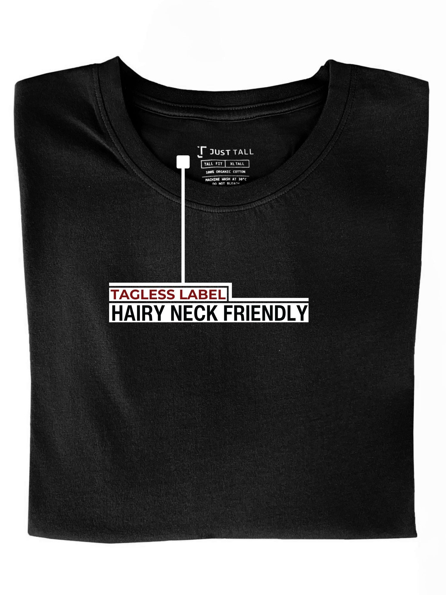 A close-up of a Just Tall heavyweight black t-shirt, showing the tagless label.