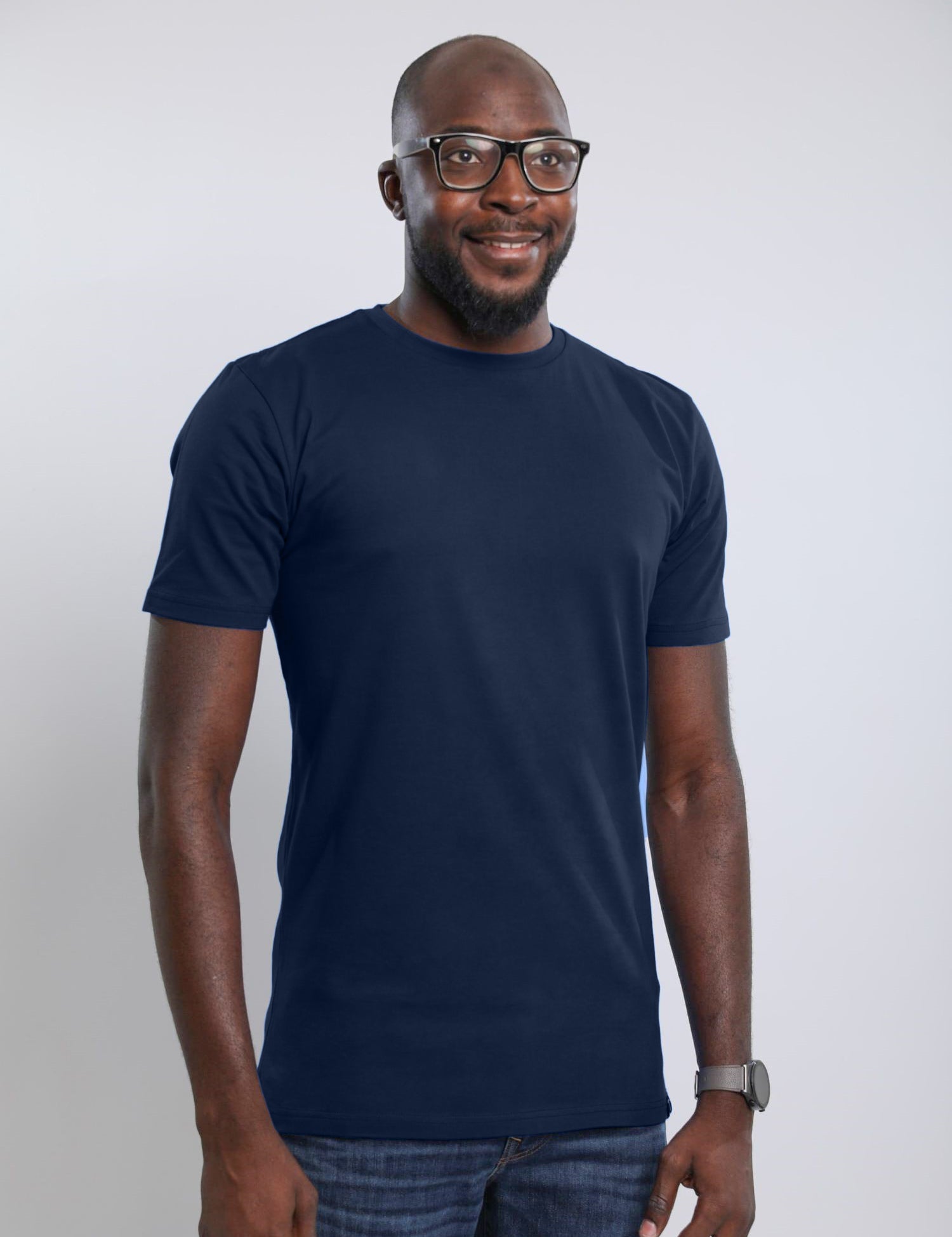 A tall slim man wearing an large tall heavyweight midnight blue t-shirt.