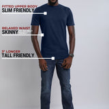 A head to toe shot of a tall slim guy wearing a large tall midnight blue heavyweight t-shirt.