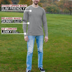 A head to toe shot of a tall athletic guy in a park wearing a light grey long sleeve tall t-shirt.