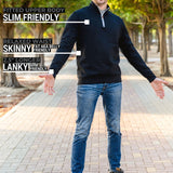 A head to toe shot of a tall slim guy in a park wearing an XL tall extra long black quarter zip sweatshirt.