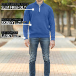 A head to toe shot of a tall slim guy in a park wearing an XL tall extra long cobalt quarter zip sweatshirt.