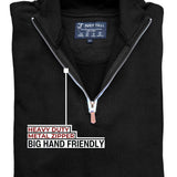 A close up of the tall black quarter zip sweatshirt's heavy duty metal zipper.