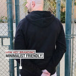 A shot from behind of a tall slim guy wearing an XL tall slim black hoodie.