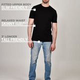 A head to toe shot of a tall muscular guy wearing a black XL tall t-shirt.