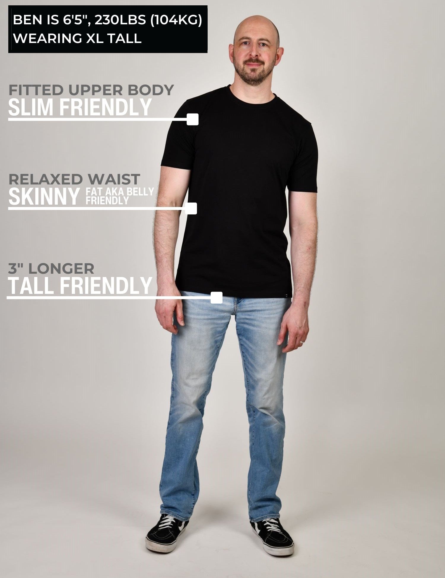 A head to toe shot of a tall muscular guy wearing a black XL tall t-shirt.