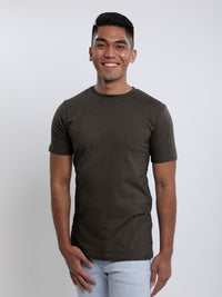 Thumbnail for Upper body shot of a tall skinny guy wearing a dark grey tall t-shirt.