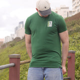 An upper body shot of a tall slim guy in an XL tall graphic t-shirt with a tall club design.