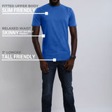 A head to toe shot of a tall athletic guy wearing a medium blue large tall t-shirt.