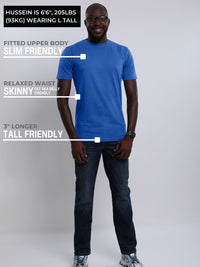 Thumbnail for A head to toe shot of a tall athletic guy wearing a medium blue large tall t-shirt.