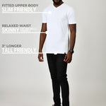 A head to toe shot of a tall and slim guy in the studio wearing a white L tall slim v-neck t-shirt.